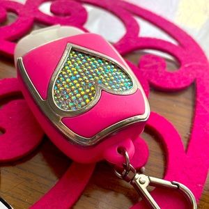 Pink hand sanitizer case key chain